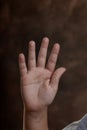 Hand with Simian line on right hand palm reading on background. Royalty Free Stock Photo